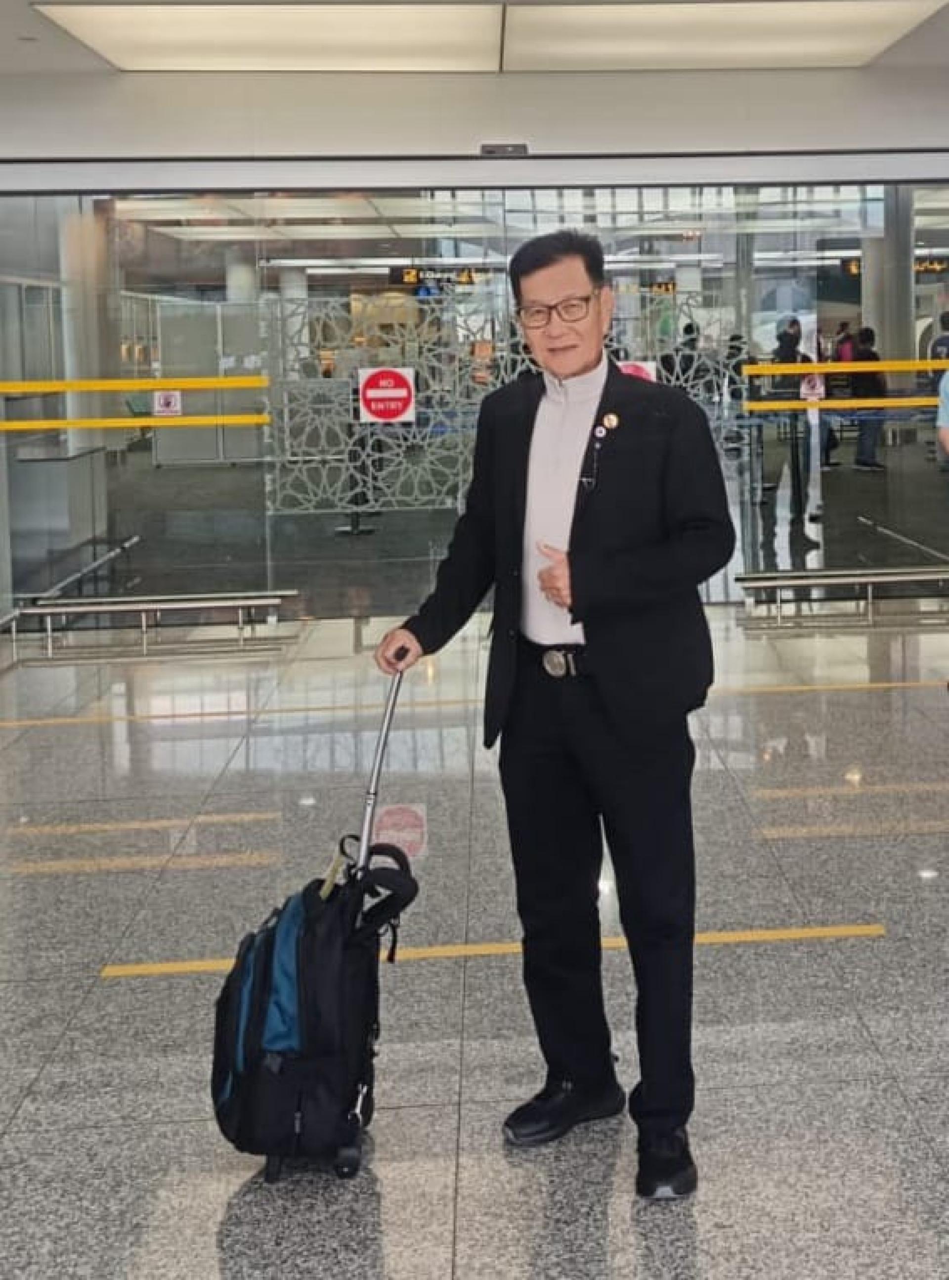 蔡仔运在机场摄