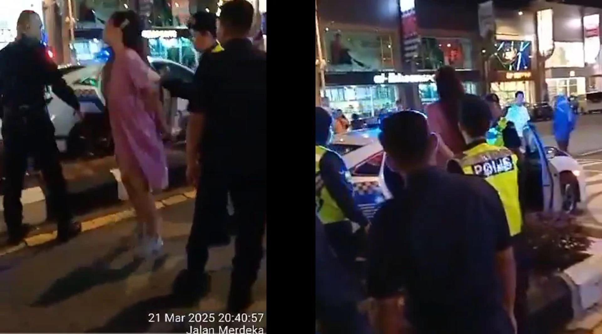 警方把涉事女子逮捕后带回警局。（网传视频截图）