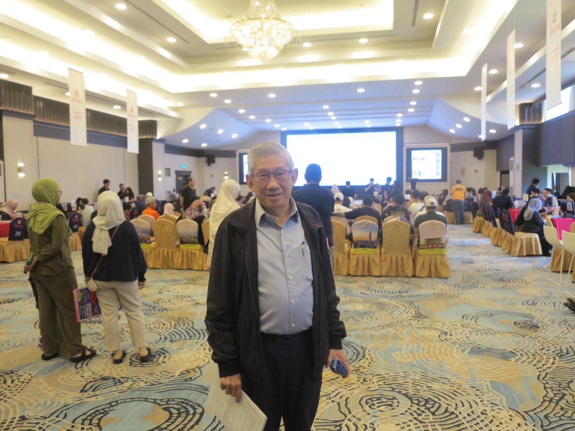 飞美旅行社董事经理李立鹏在会场摄