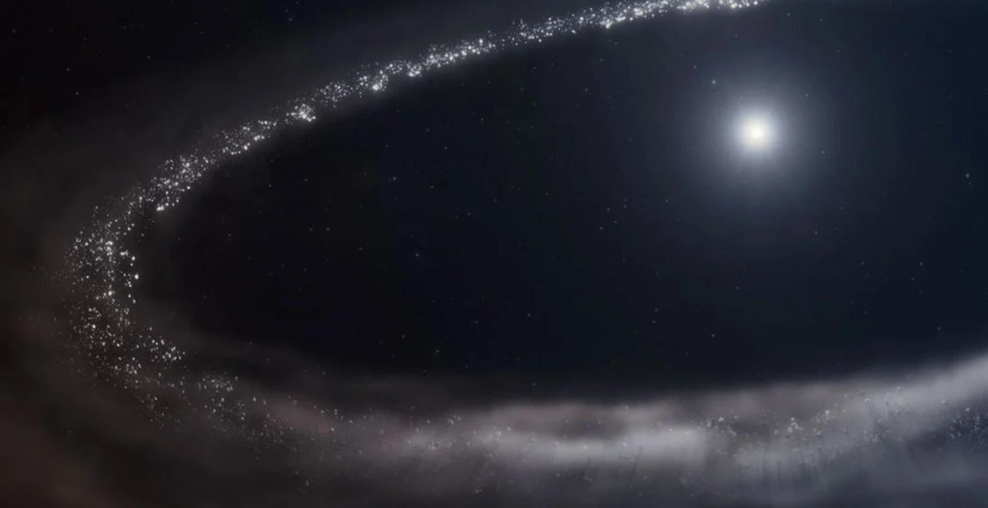 研究人员首次证实，在围绕类太阳恒星运行的尘埃碎片盘中存在结晶水冰。（构想图）