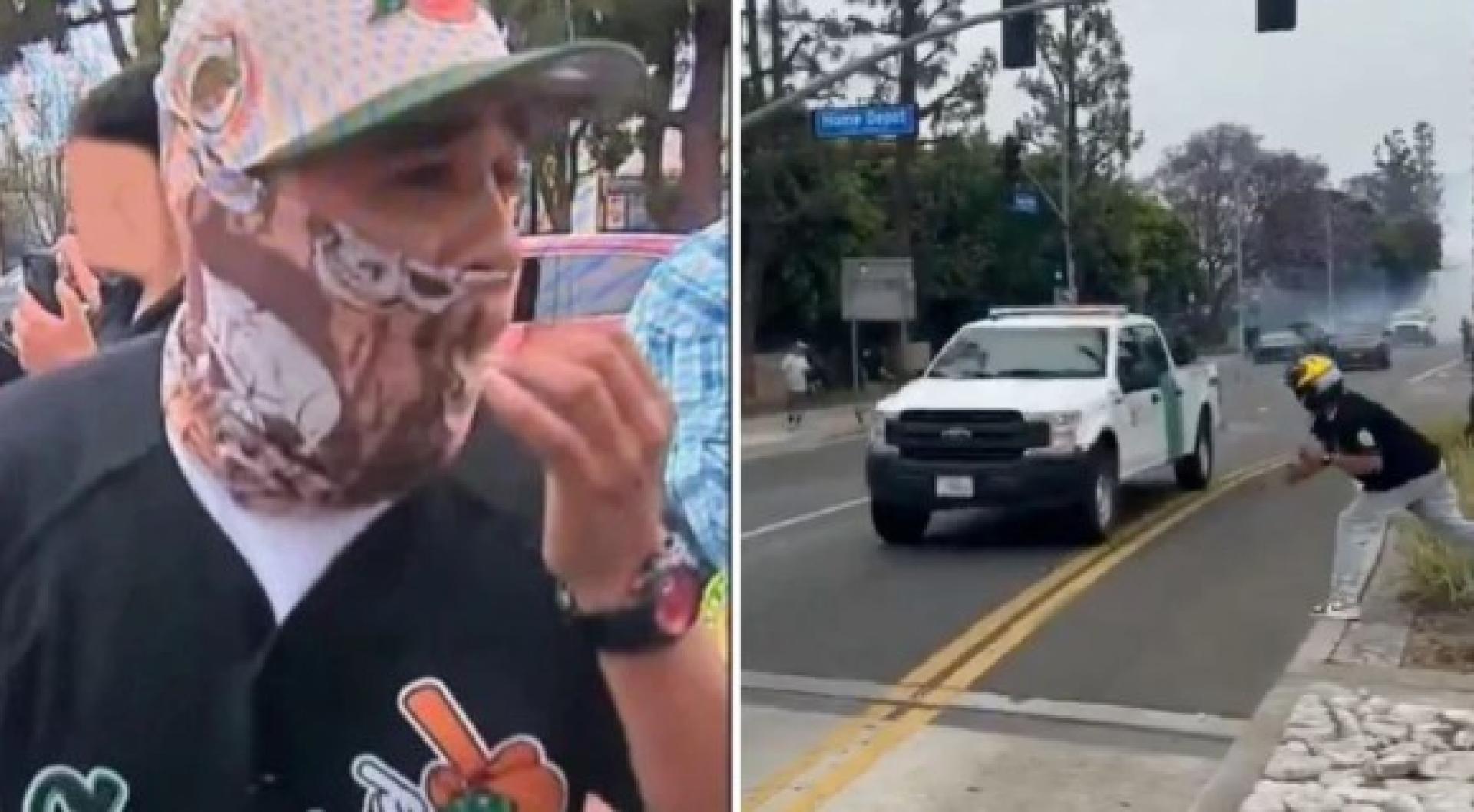 嫌犯被拍到向警方车辆投掷物品。