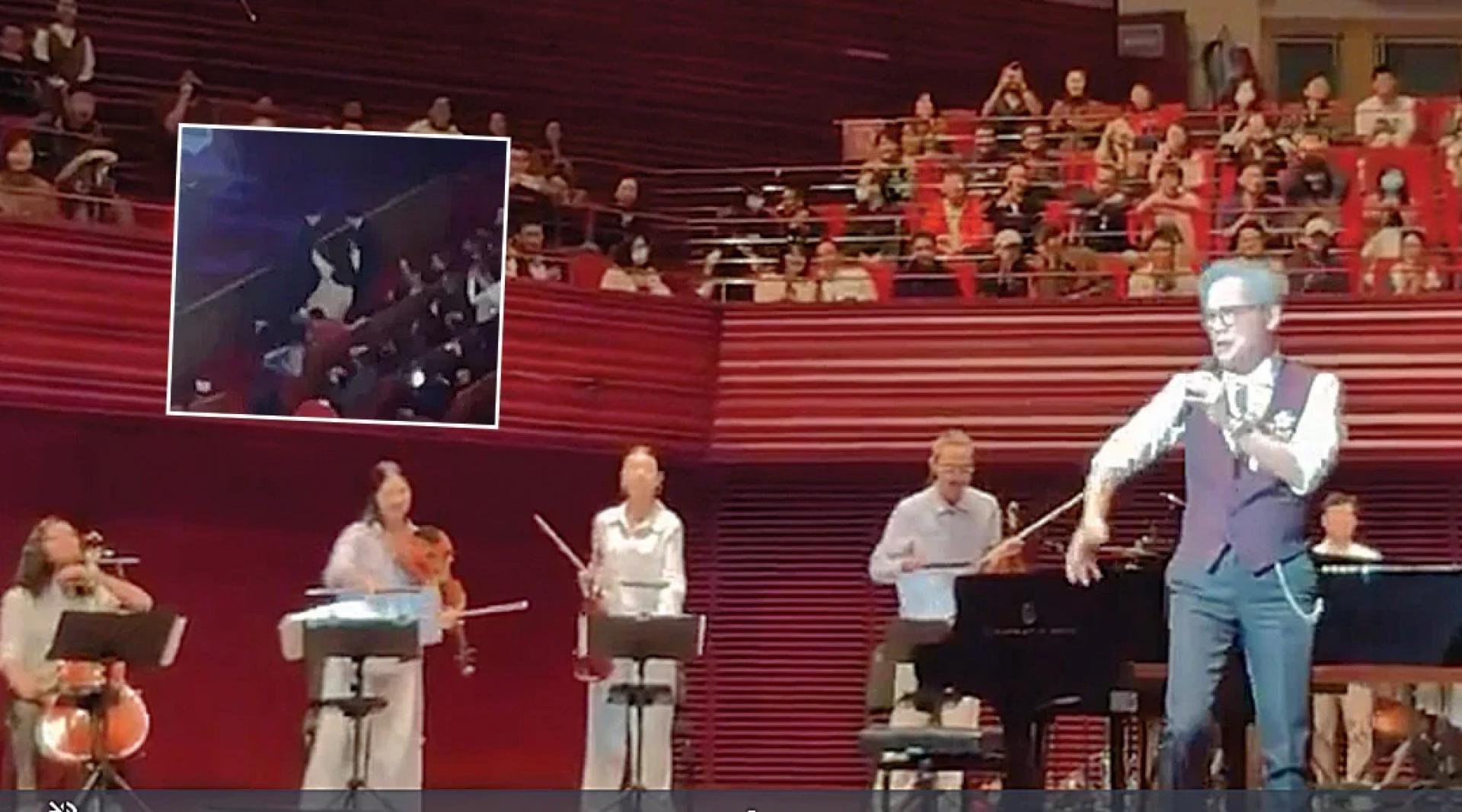 罗大佑在深圳演出。 （小图）闹场女子最后被强行拖走。