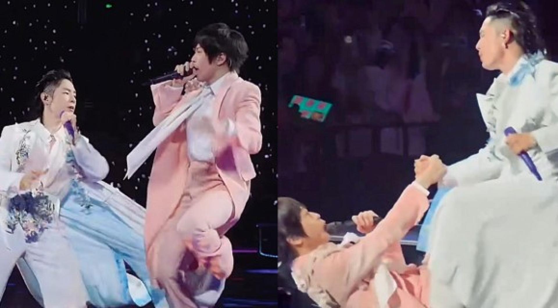 阿信（左图右）演唱时脚勾到吴建豪的衣服，造成重心不稳跌倒。