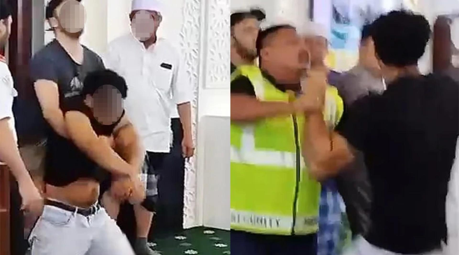 男子被旁人拉上来，在保安等人合力制伏。