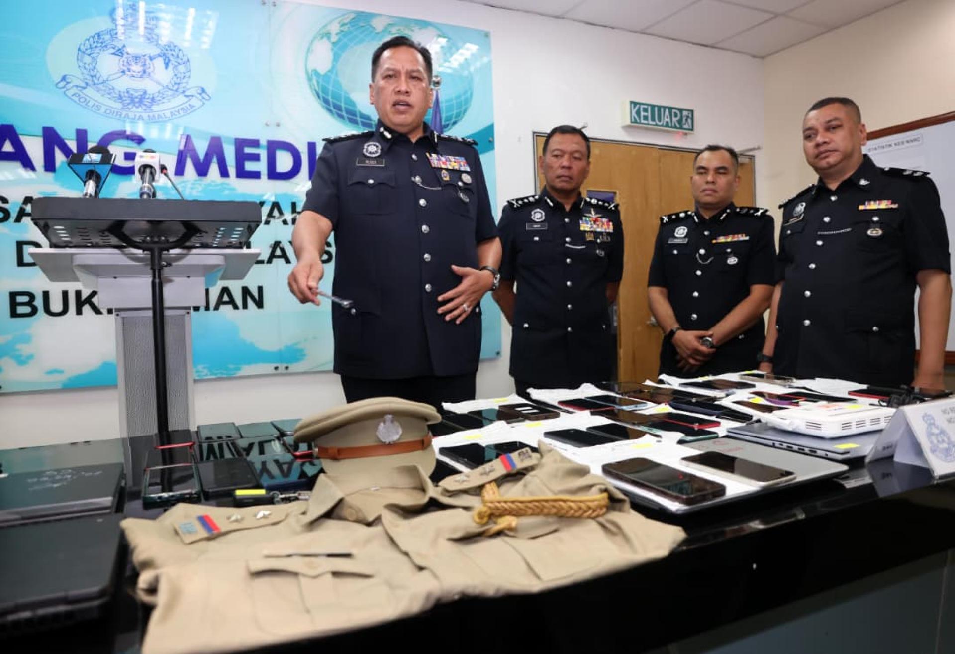 鲁斯迪召开记者会，宣布瓦解冒警电诈集团。