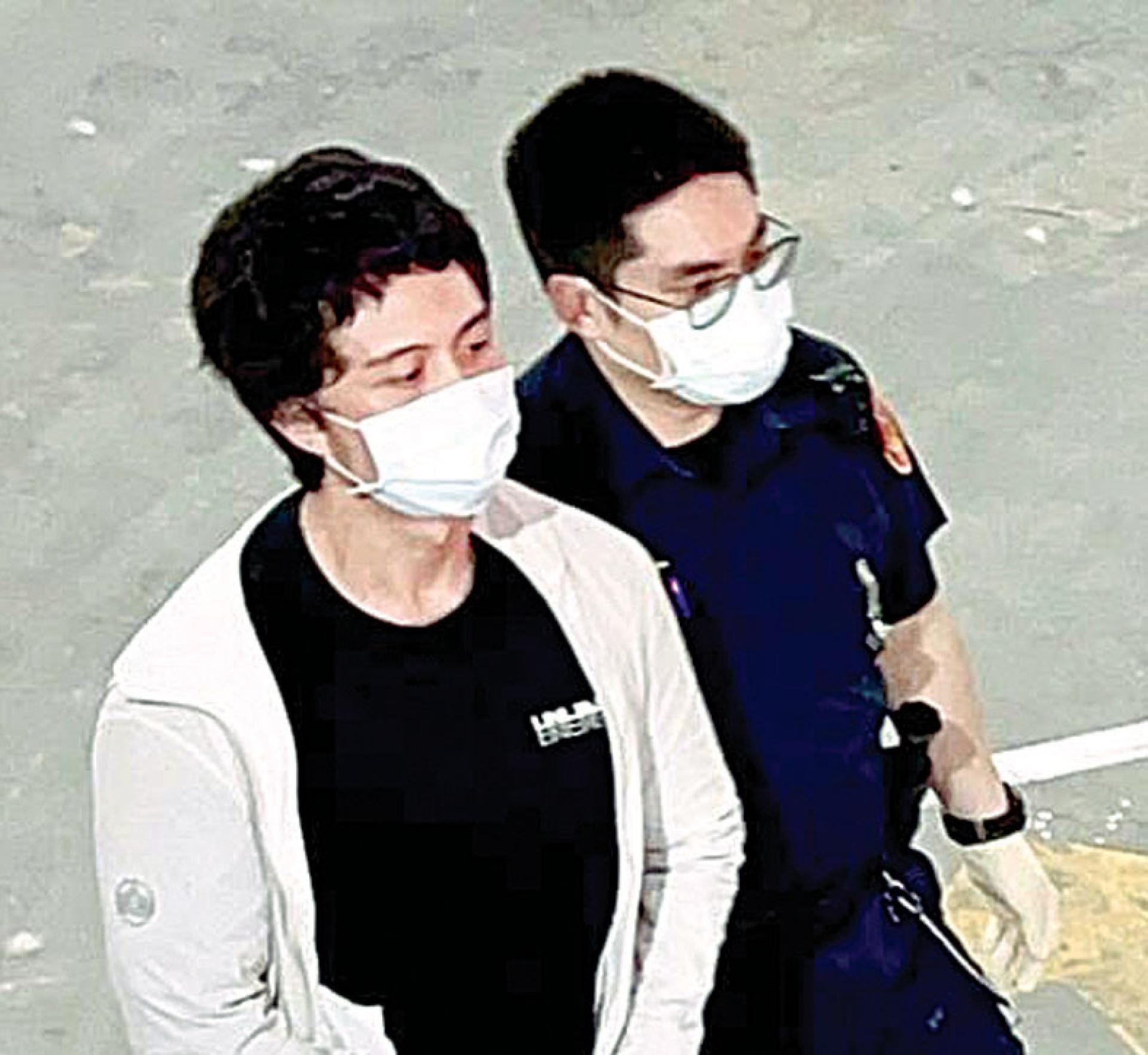 孙安佐（左）遭起诉。