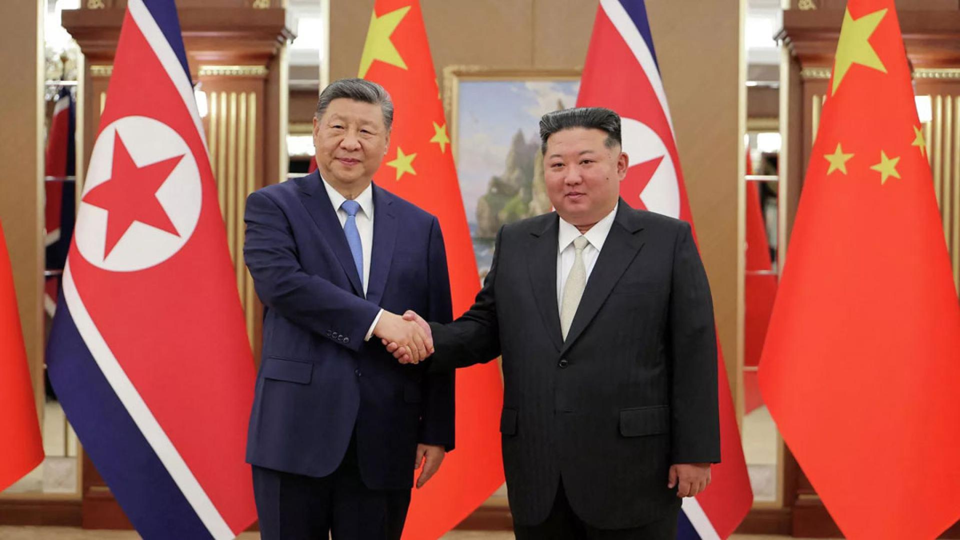 金正恩致贺习近平深化两国友好合作。