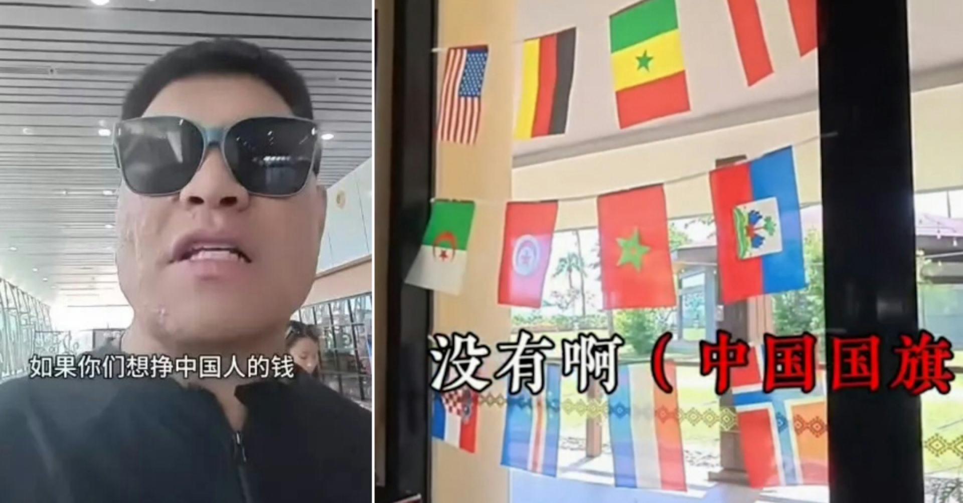 这名身穿黑衣戴着墨镜的男子，在大马一家酒店食用早餐时，看到走廊悬挂多国国旗，便认定“所有国家都有，唯独没有中国”，随即把酒店员工叫来理论。