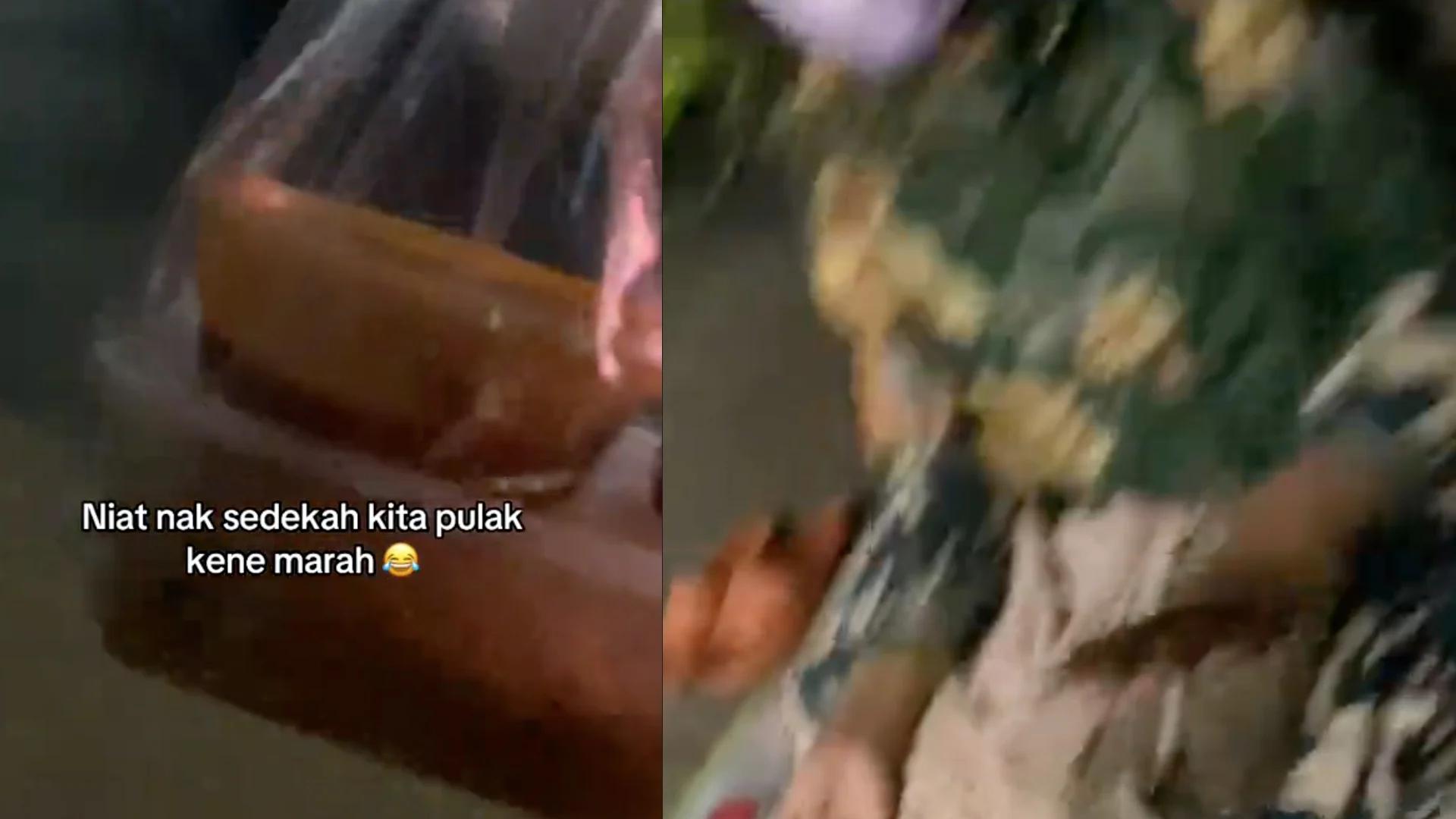 一名男子想要施舍食物给流浪者，却被流浪者大骂。